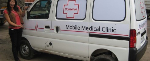 Jenna and the new mobile medical clinic van